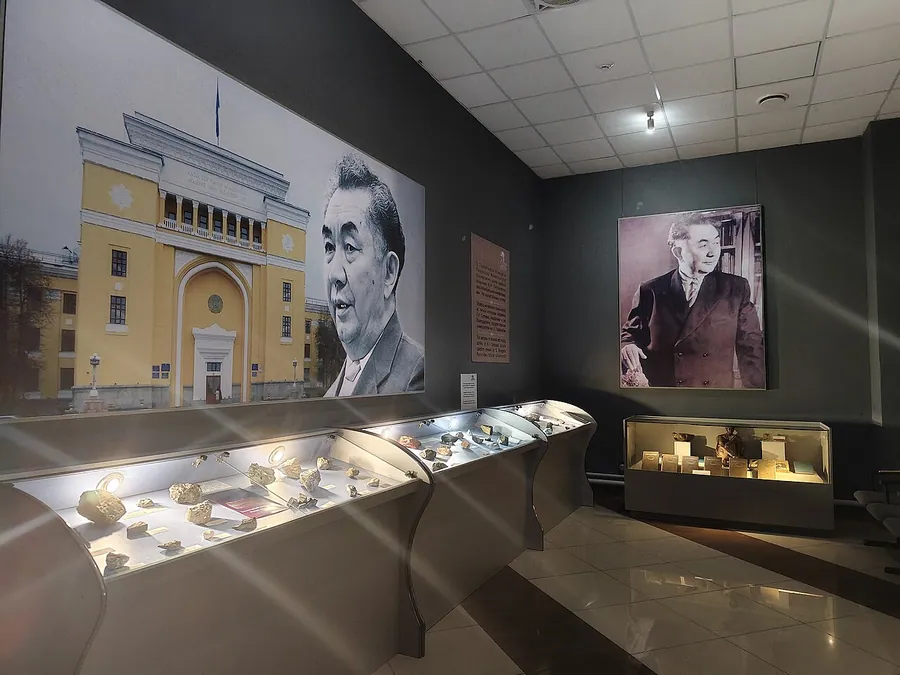 Exhibition hall dedicated to geologist Kanysh Satpayev, displaying mineral samples and photographs. Ertis…