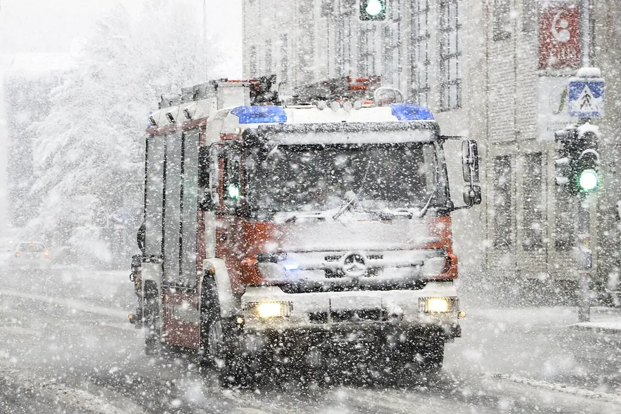 Firefighter engine emergency driving while heavy snowing.. Фото: This Photo was taken by Miha Peče . Feel…