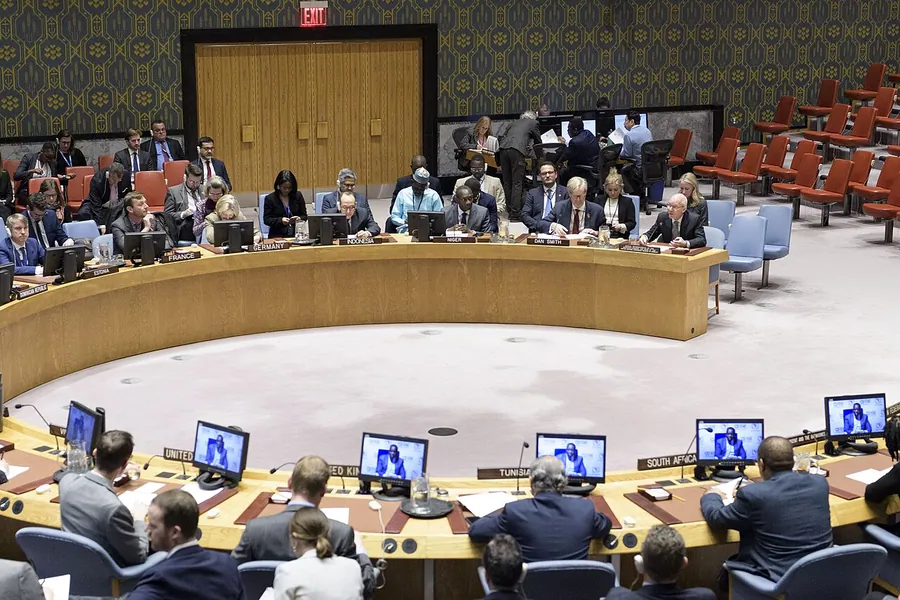 Members of the Security Council listen to the remarks of the UN envoy to Somalia, James Swan, at their…